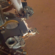 The landing site is wonderfully smooth, as imaged by the Instrument Deployment Camera attached to InSight’s robotic arm.